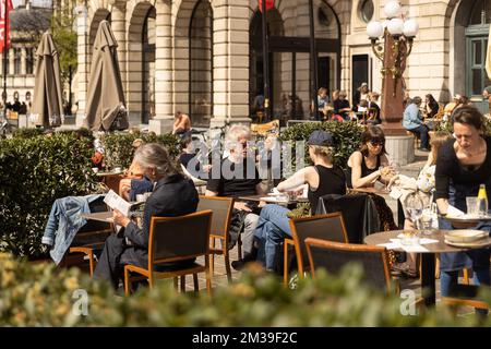Illustration shows people enjoying nice weather at Belgian coast, in De ...