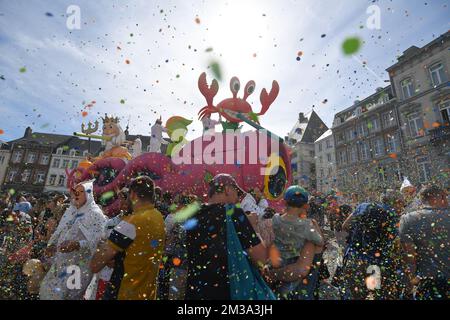Illustration picture shows a folcloric carnival parade in Stavelot, Sunday 15 May 2022. The parade replaces the Laetare of Stavelot which is traditionally held on Laetare Sunday and is very well known for its 'Blancs Moussis', showering people with confetti, dressed in a white costume with hood and a red pointed nose. BELGA PHOTO JOHN THYS  Stock Photo