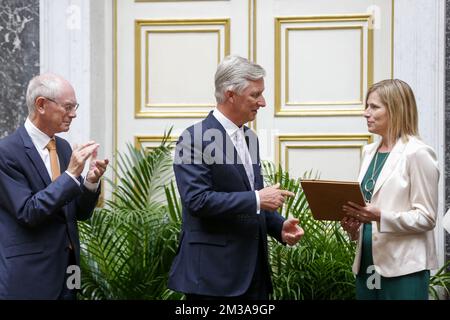 Herman Van Rompuy, King Philippe - Filip of Belgium and Veerle Rots pictured during a ceremony to award the 'Francqui Prize' scientifi awards for 2021 and 2022, Wednesday 01 June 2022 in Brussels. The 2021 prize is awarded to ULiege astrologist Michael Gillon, ULiege's Veerle Rots will receive the 2022 one for her Palaeolithic Stone Tool Hafting research. The scientific prize, which is often referred to as the 'Belgian Nobel Prize', is awarded by The Francqui Foundation and is worth 250.000 euros. BELGA PHOTO NICOLAS MAETERLINCK