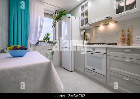 New light grey modern well designed kitchen interior Stock Photo - Alamy