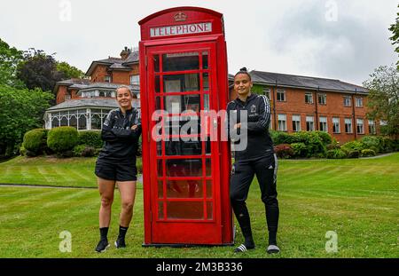 Belgium's goalkeeper Diede Lemey and Belgium's goalkeeper Nicky Evrard posing for the photographer next to an English telephone boot ahead of a press conference of the Belgium's national women's soccer team the Red Flames, Friday 08 July 2022 in Wigan, England, in preparation of the Women's Euro 2022 tournament. The 2022 UEFA European Women's Football Championship is taking place from 6 to 31 July. BELGA PHOTO DAVID CATRY Stock Photo