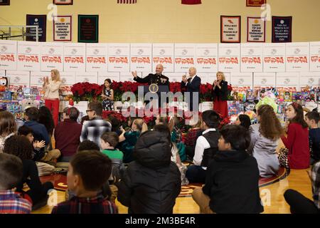 Arlington, United States. 12 December, 2022. U.S. Marine Corps Reserve General David Bellon, center,  welcomes President Joe Biden and First Lady Jill Biden, right, to the 75th anniversary Toys for Tots sorting at Joint Base Myer-Henderson Hall, December 12, 2022 in Arlington, Virginia.  Credit: Sgt. Ellen Schaaf/US Marine Corps/Alamy Live News Stock Photo