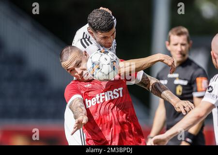 Antwerp's Radja Nainggolan and Eupen's Isaac Christie-Davies fight for the ball during a soccer match between KAS Eupen and Royal Antwerp FC RAFC, Sunday 14 August 2022 in Eupen, on day 4 of the 2022-2023 'Jupiler Pro League' first division of the Belgian championship. BELGA PHOTO BRUNO FAHY Stock Photo