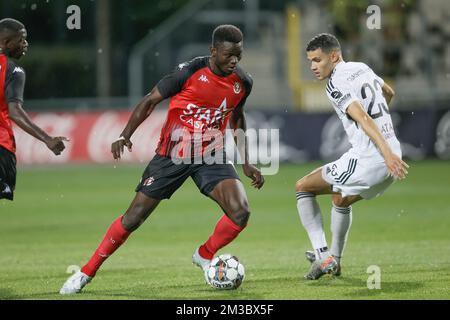 Seraing's Marius Mouandilmadji and Eupen's Isaac Christie-Davies fight for the ball during a soccer match between KAS Eupen and RFC Seraing, Friday 19 August 2022 in Eupen, on day 5 of the 2022-2023 'Jupiler Pro League' first division of the Belgian championship. BELGA PHOTO BRUNO FAHY Stock Photo