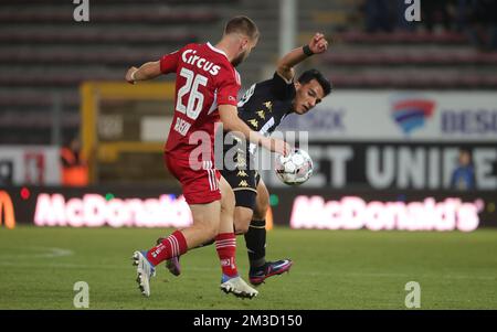 Standard's Nicolas Raskin and Charleroi's Amir Hosseinzadeh fight for the ball during a soccer match between Sporting Charleroi and Standard Liege, Sunday 09 October 2022 in Charleroi, on day 11 of the 2022-2023 'Jupiler Pro League' first division of the Belgian championship. BELGA PHOTO VIRGINIE LEFOUR Stock Photo