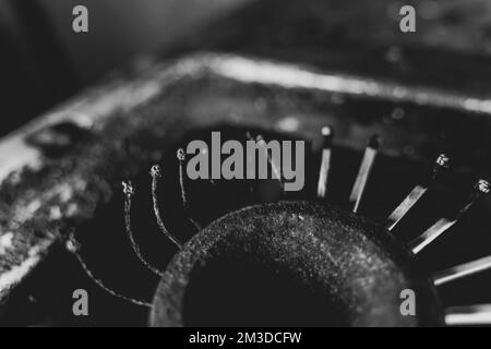 Limited resource for heating and cooking. Wooden matches instead of fire in the burner of a gas stove close-up. Low standard of living, survival in po Stock Photo