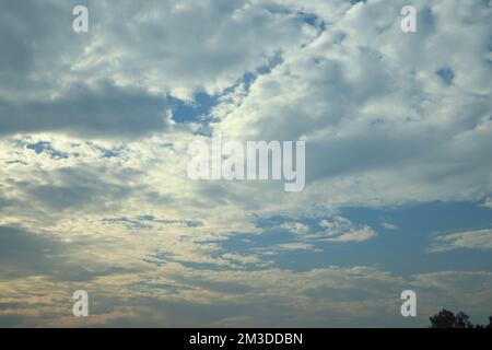 blue sky background with tiny clouds Stock Photo