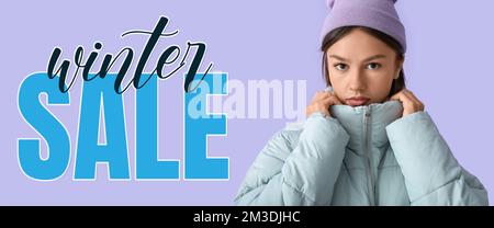 Pretty young woman in stylish warm clothes and text WINTER SALE on lilac background Stock Photo