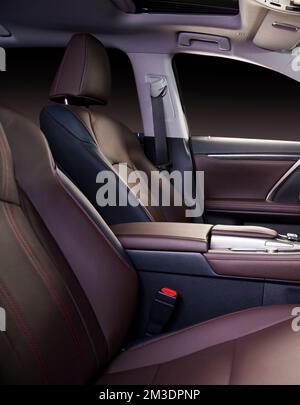Modern luxury race car  black and red perforated leather interior. Part of  leather car seat details. Stock Photo