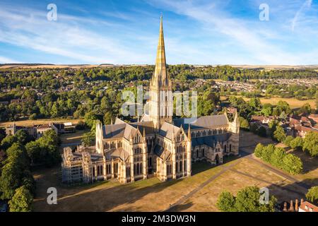 Aerial view of Salisbury cathedral at sunrise, England. Copy space in sky. Stock Photo