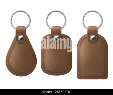 Leather keychains, brown keyring holders set with metal rings. Accessories or souvenir trinkets for home, car or office isolated on white background. Realistic 3d vector illustration, icon, mockup Stock Vector