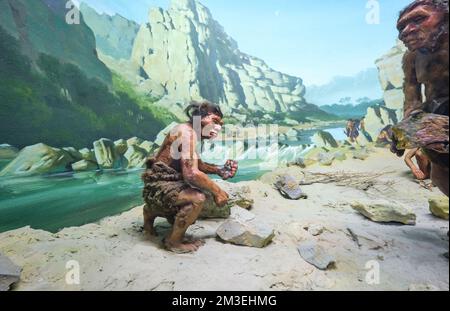 Three Men Breaking Rocks Stone age, cave men busy breaking rocks, building tools with bones ...