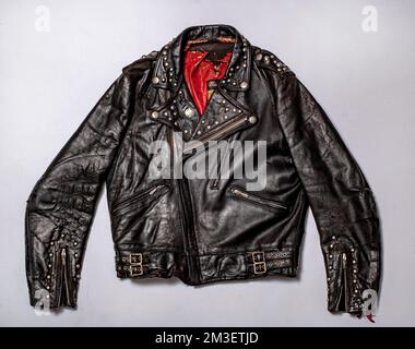 Vintage black leather biker jacket, isolated on white background Stock Photo