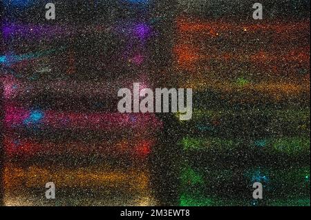 abstract colors traces on a  black surface Stock Photo