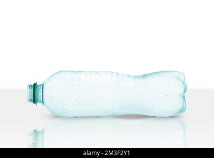 empty plastic water bottle horizontally isolated on white background Stock Photo