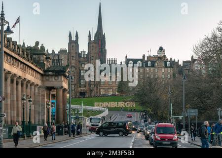 Edinburgh Scotland  23 November2022: A view in Edinburgh looking up The Mound to the Assembly Hall with the church spire of  Tollbooth Kirk and Nation Stock Photo