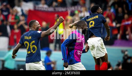 Doha, Qatar. 14th Dec, 2022.  Marcus Thuram (FRA), Dayot Upamecano (FRA), Aurelien Tchouameni (FRA) celebrate the entry into the final France - Morocc Stock Photo