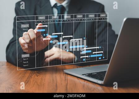 Project manager analyst working with computer in management system to ...