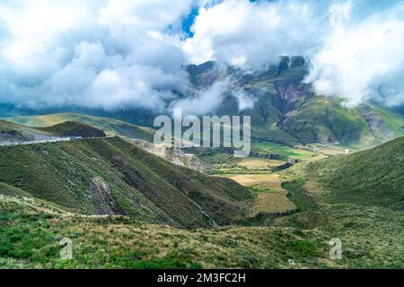 winding mountain roads in the Andes Mountains with a sky overcast with clouds.  Stock Photo
