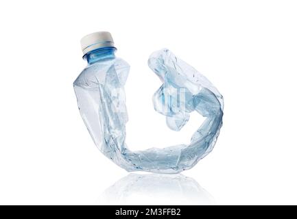 crushed plastic bottle of mineral water on white background Stock Photo