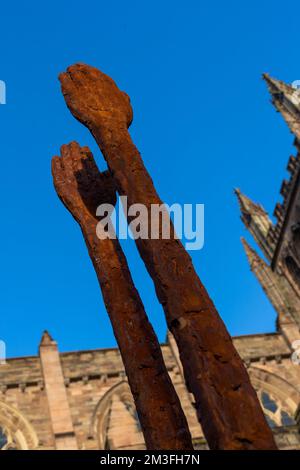 'Beyond Limitations' sculpture, bronze sculpture by John O'Connor in the Lady Arbour Cloister Garden, Cathedral grounds, Hereford. Stock Photo