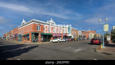 Panoramic view of historic downtown from the intersection of 1st Street & Grand Avenue in Laramie, Wyoming Stock Photo