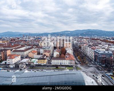 Skyline of Turin, Italy, in winter. The mountain in back and the Mole Antonelliana, Piazza Castello, Porta Susa Station, Turin court and the city cent Stock Photo