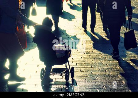 Glasgow, Scotland, UK 15th December, 2022. Christmas Shopping on the style mile of Scotland, Buchanan street. Saw shoppers enter into the festive spirit of buying stuff as the streets and shops were packed in the sunshine. Credit Gerard Ferry/Alamy Live News Stock Photo