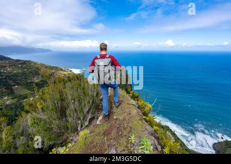Hikers on the ridge of Pico do Alto, panorama, view of coast and sea, Madeira, Portugal Stock Photo
