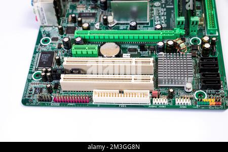 Installing a new RAM DDR memory for a personal computer processor socket in a service. Upgrade repair. PC upgrade or repair concept. Isolated Stock Photo