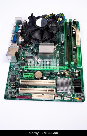 Installing a new RAM DDR memory for a personal computer processor socket in a service. Upgrade repair. PC upgrade or repair concept. Isolated Stock Photo
