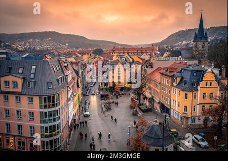 View of Wagnergasse with the catholic parish 'St. Johannes Baptist' on the right side at sunset, Jena, Thuringia, Germany Stock Photo