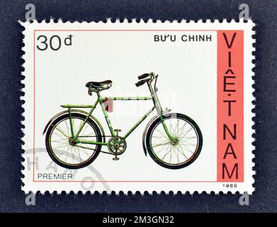 Cancelled postage stamp printed by Vietnam, that shows Premier bicycle, circa 1988. Stock Photo