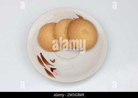 Three biscuit cookies isolated round crispy,biscuit isolated plate on white  background. Stock Photo