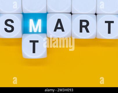 Smart Start. Cubes form words Smart - Start. Extensive concept from business strategy to startup Stock Photo