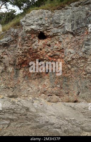 Rock face at the beach at Silverdale Cove, Silverdale, Cumbria, England ...