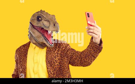 Portrait of a funny showman in a leopard suit and yellow shirt. Stock Photo