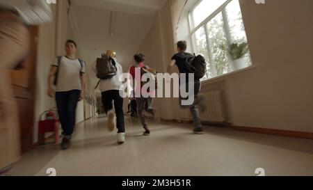 Change at school. Stock footage.Running schoolchildren from a briefcase to a lesson in the classrooms of the school. High quality 4k footage Stock Photo