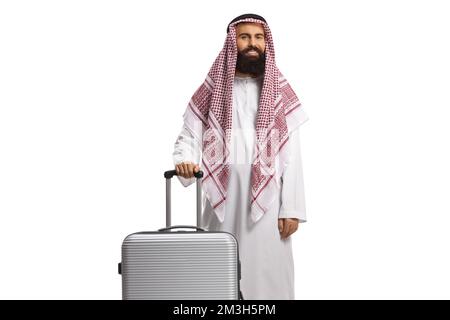 Saudi arab man in a thobe posing with a suitcase isolated on white background Stock Photo