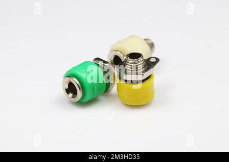 Metal-plastic connectors for connecting electrical cords on a white background. Electronic components. Stock Photo