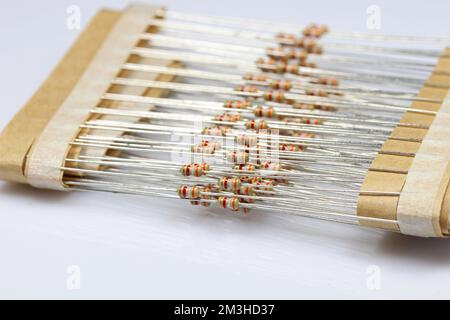 Electronic components: resistors on paper tape. Two-terminal passive components. Stock Photo