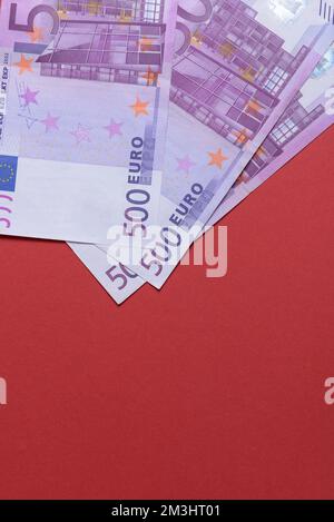 500 euro banknotes on a red background close up Stock Photo