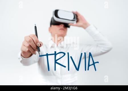 Hand writing sign Trivia. Business showcase details considerations pieces information little importance or value Stock Photo