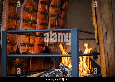 salmon cooked on an open fire Stock Photo
