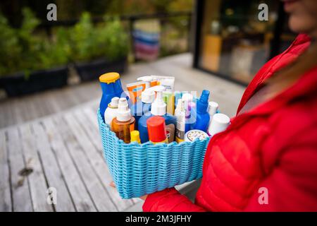 container of sunscreen, buy spray and summer lotions in summer australia in spring Stock Photo