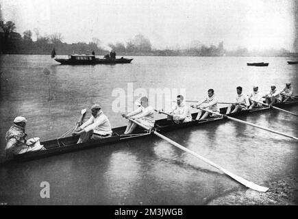 The Cambridge University rowing team practising prior to the Oxford versus Cambridge boat race in 1897.     Date: 1897 Stock Photo