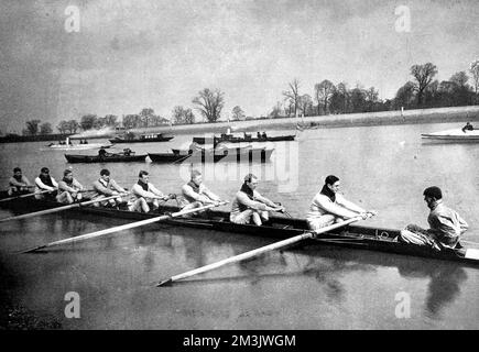 The Oxford rowing team practising for the 1897 Oxford versus Cambridge Boat Race.     Date: 1897 Stock Photo