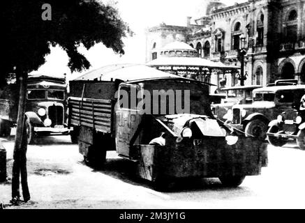 Photograph showing an armoured lorry used by the 'Union General de Trabajadores' ('UGT') and the 'Unidos Hermanos Proletarios' ('UHP'), pictured in San Sebastian, northern Spain, August 1936.      In the first weeks of the civil war the Republican had to improvise armoured transport, in order to counter the better equipped Nationalist forces.  The 'UGT' and 'UHP' were two of the unions which fought for the Republican side during the Spanish Civil War of 1936-39.     Date: 1936 Stock Photo