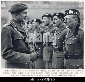 Lieutenant-General A.F.M. Browning, Commander of the British First Airborne (on left), talking to Major R.H. Cain (second right), the first V.C. winner in the Airborne, and Lieutenant-Colonel Payton-Reid (right)at a farewell parade held at Buckingham Palace, London, 6th December 1944. Stock Photo
