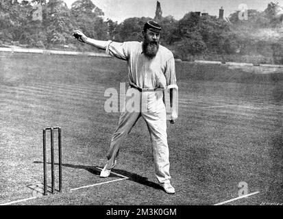 Dr. William Gilbert Grace (1848 - 1915), bowling at the Crystal Palace cricket ground, London. Grace was arguably the finest cricketer of his era, scoring 126 first-class centuries and taking 2876 wickets, playing for England and Gloucestershire. Stock Photo